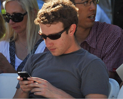 Zuckerberg-checking-email-on-mobile-device
